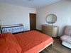 apartmán ložnice manželská postel